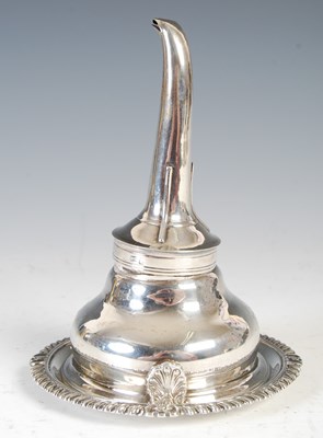 Lot 558 - A George III Scottish silver wine funnel and...