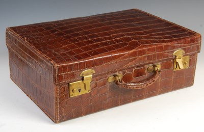 Lot 187 - A vintage brown leather travel case, with...