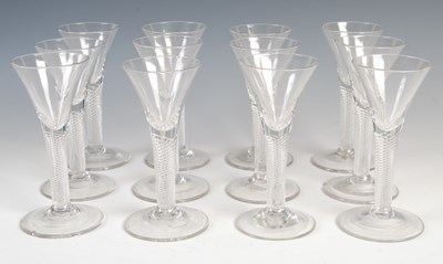 Lot 769 - A set of twelve 18th century air twist wine...
