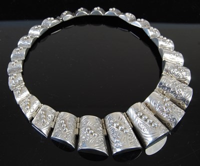 Lot 644 - A Mexican sterling silver articulated necklace,...