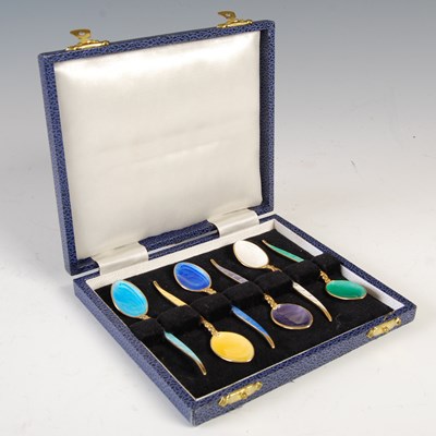 Lot 532 - A cased set of six silver gilt and coloured...