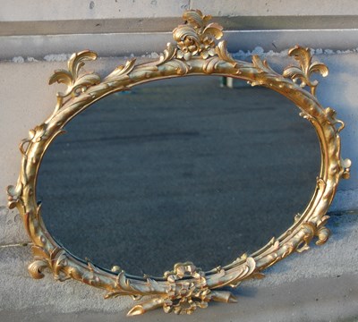 Lot 148 - A late 19th/early 20th century gilt wood oval...