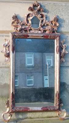 Lot 153 - A 20th century decorative wall mirror in the...