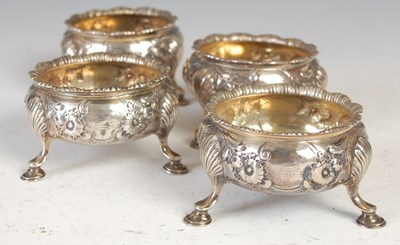 Lot 524 - A set of four George II silver gilt salts,...