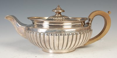 Lot 512 - A George III silver teapot, London, 1807,...