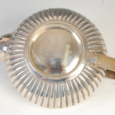 Lot 512 - A George III silver teapot, London, 1807,...