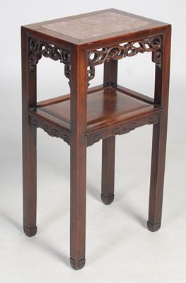 Lot 58 - A Chinese darkwood urn stand, late Qing...