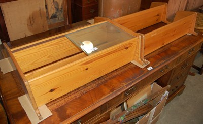 Lot 667 - Two pine hanging shelves, one with two glazed...