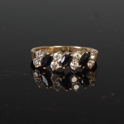 Lot 46 - A 9ct gold and sapphire dress ring, set with...