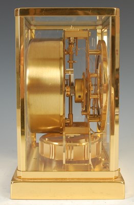 Lot 233 - A Jaeger-LeCoultre brass cased Atmos clock,...