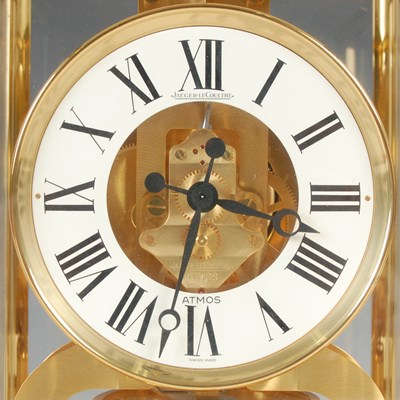 Lot 233 - A Jaeger-LeCoultre brass cased Atmos clock,...