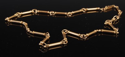 Lot 719 - A 9ct gold necklace, with cylindrical and oval...