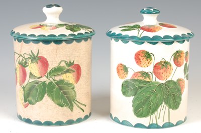 Lot 783 - Two large Wemyss preserve jars and covers,...