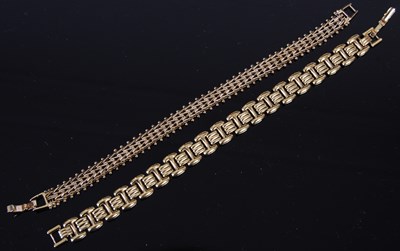 Lot 705 - Two gold-plated bracelets, both 19.5cm long,...