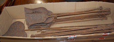 Lot 687 - A collection of assorted fire irons to include...