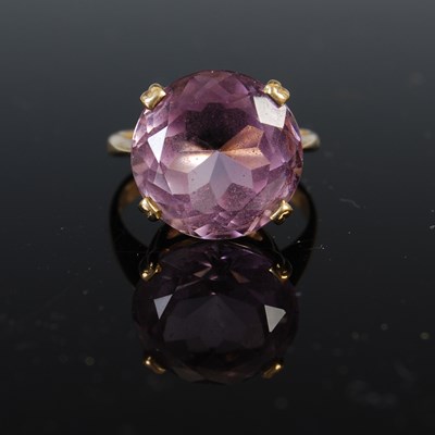 Lot 663 - A 9ct gold and amethyst dress ring, set with a...