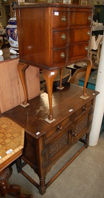 Lot 671 - An early 20th century oak side cabinet with...