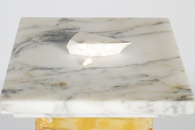Lot 59 - An early 20th century marble pedestal, the...