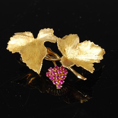 Lot 717 - A mid-20th century yellow metal and ruby...