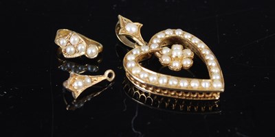 Lot 664 - A gold and pearl heart-shaped pendant, with...