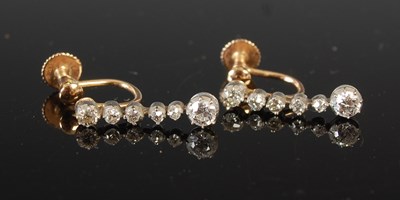 Lot 706 - A pair of Edwardian diamond drop earrings,...