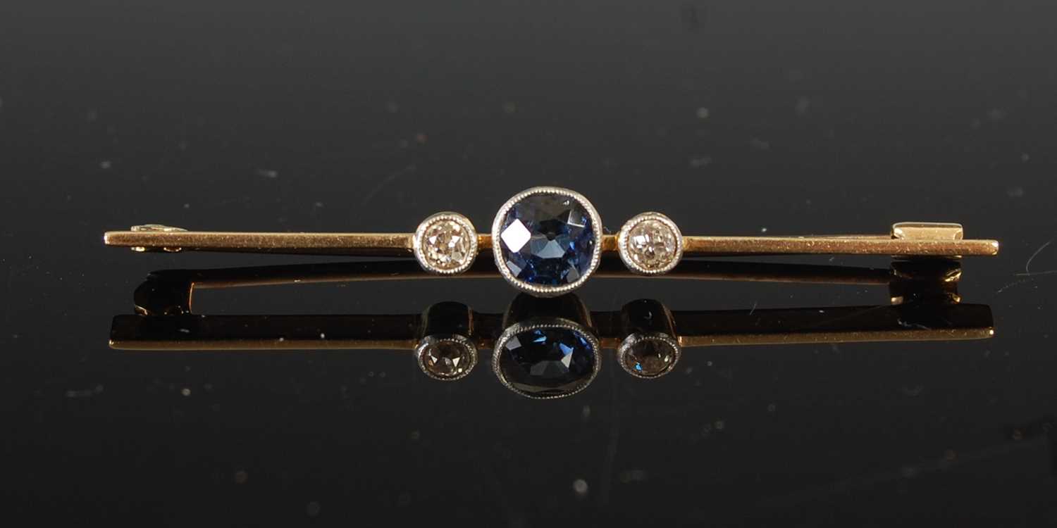 Lot 701 - An Edwardian diamond and sapphire three-stone...