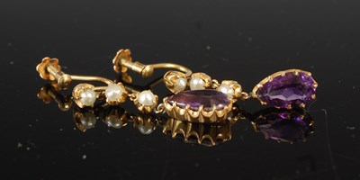 Lot 661 - A pair of Edwardian amethyst & pearl drop...