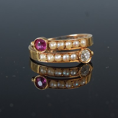 Lot 700 - A late Victorian 18ct. gold ring, with two...