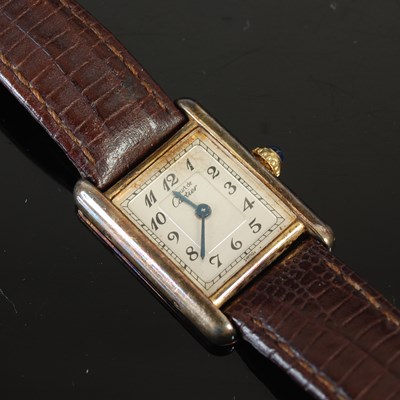 Lot 631 - A Cartier silver-gilt tank wristwatch,...