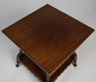 Lot 40 - An early 20th century Arts & Crafts mahogany...