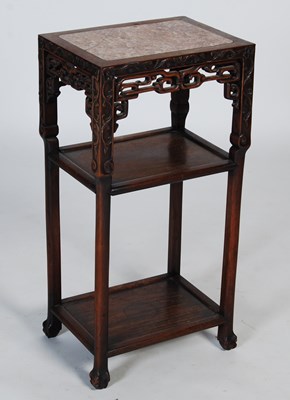 Lot 60 - A Chinese darkwood urn stand, late 19th...