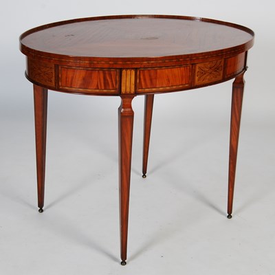 Lot 104 - An early 20th century satinwood and marquetry...