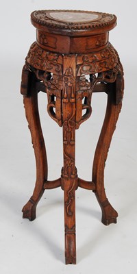 Lot 66 - A Chinese darkwood urn stand, late 19th...