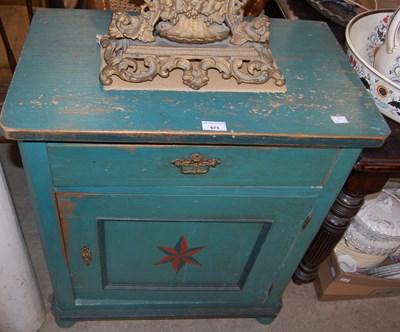 Lot 673 - A painted pine side cabinet, the single frieze...