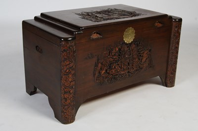 Lot 37 - A Chinese camphor wood blanket box, carved in...