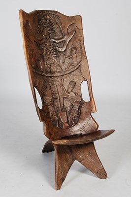 Lot 22 - An African tribal birthing chair, formed in...