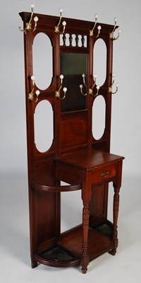 Lot 77 - A Victorian walnut mirror back hall stand, the...