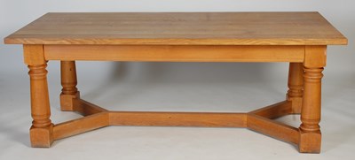 Lot 13 - A modern oak extending kitchen/refectory table,...