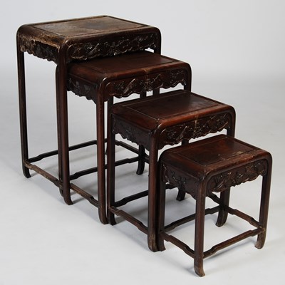 Lot 90 - A Chinese darkwood nest of four occasional...