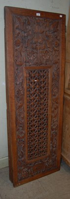 Lot 725 - A carved oak three-division screen, the inner...