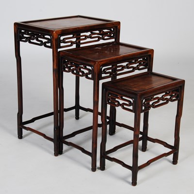 Lot 72 - A nest of three Chinese darkwood occasional...