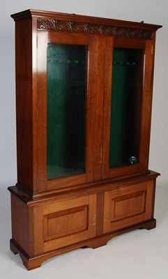 Lot 87 - A 20th century mahogany gun cabinet fitted...