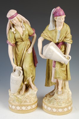 Lot 802 - A pair of Royal Dux porcelain figures of male...