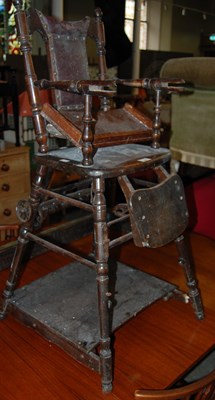 Lot 728 - A 19th century dark wood childs high chair.