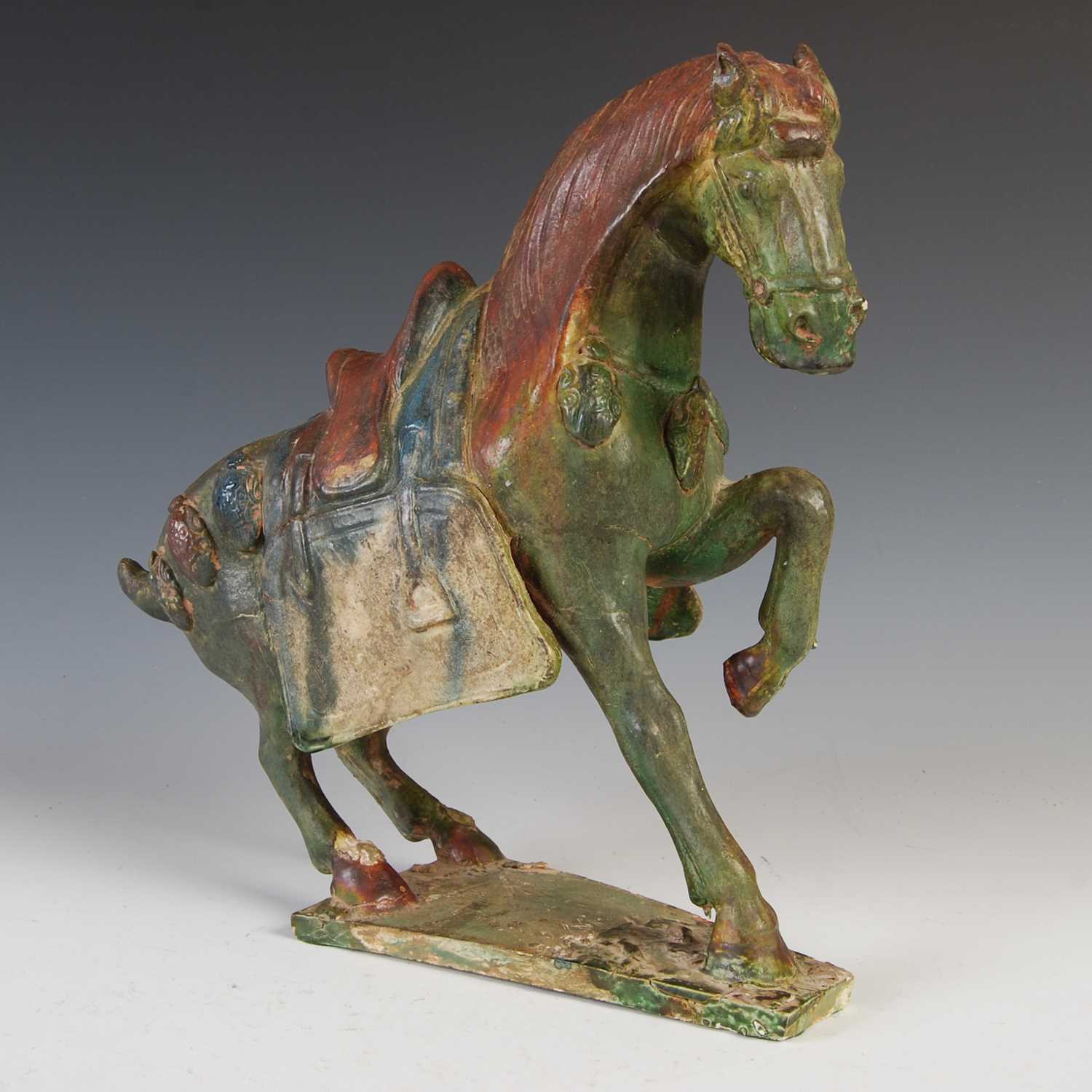 Lot 810 - A Chinese pottery Tang Dynasty style model of...