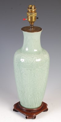 Lot 812 - A Chinese porcelain celadon vase later mounted...