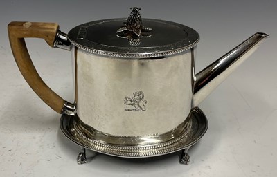 Lot 541 - A George III silver oval teapot, with beaded...