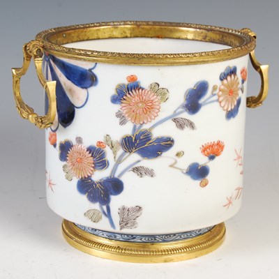 Lot 849 - A Japanese Imari porcelain jardiniere with...