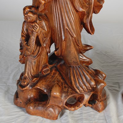 Lot 844 - A pair of Chinese carved wood figures of...