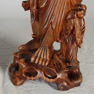 Lot 844 - A pair of Chinese carved wood figures of...
